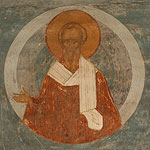 Неизвестный святитель (апостол от 70). Старец с разделенной на три пряди бородой, в гиматии, с омофором (без крестов); правой рукой благословляет, в левой — свиток.